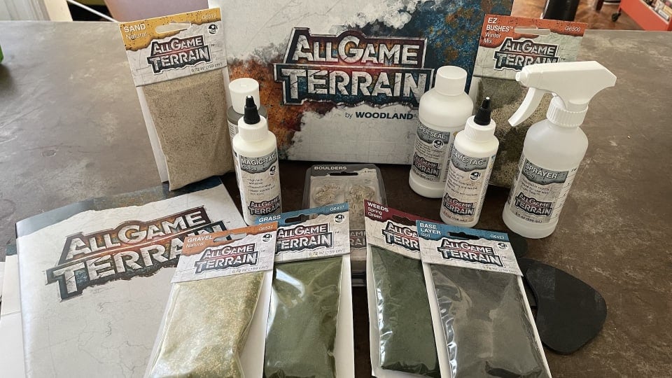 An image of a variety of All Game Terrain products laid out on a table, the header image to our All Game Terrain Review.