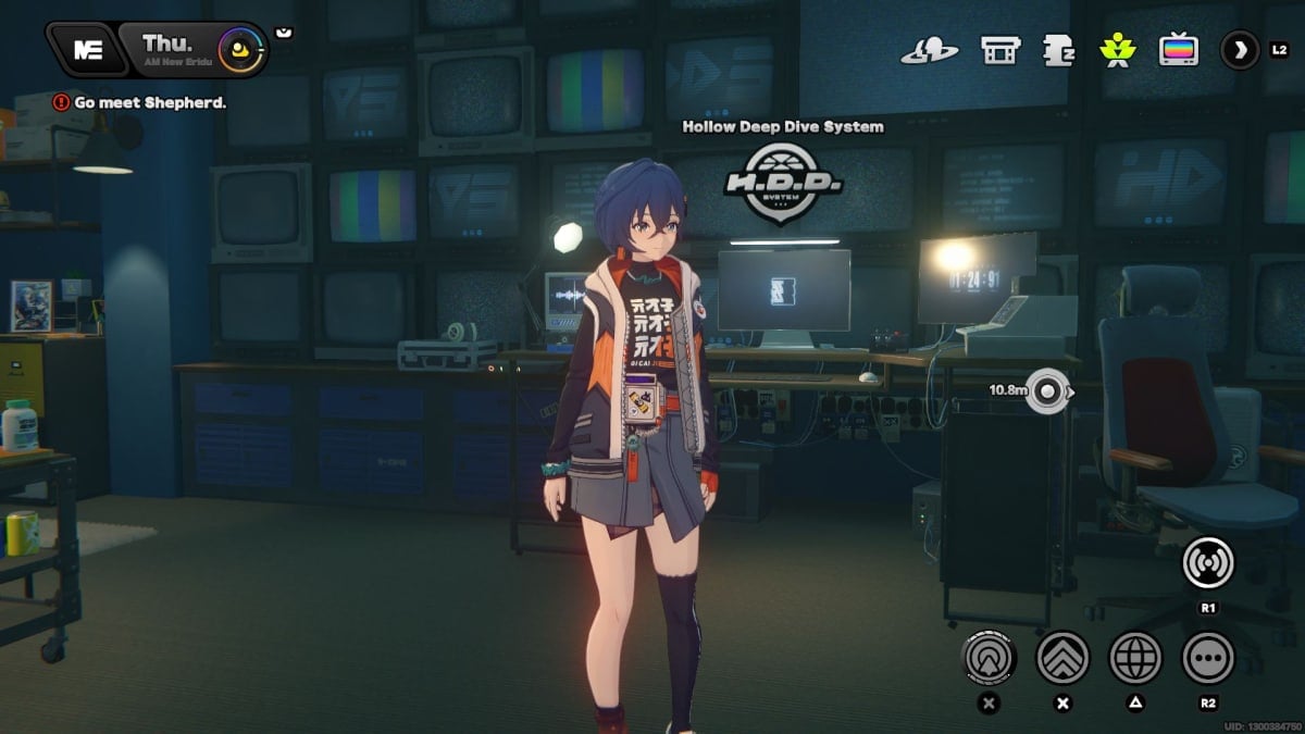 Belle Standing in front of her PC.