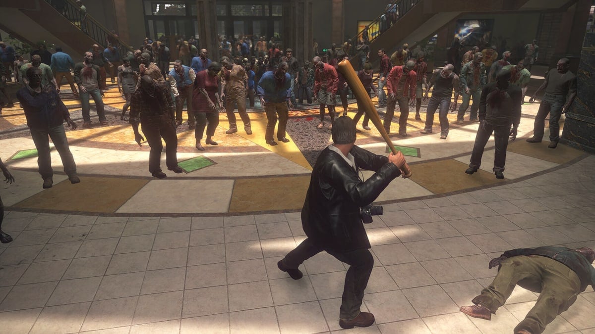 Frank brandishing a baseball bat as a horde of zombies approaches in Dead Rising Deluxe Remaster