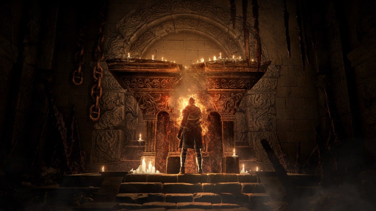 The player reaching out towards an altar, which appears to be aflame, in Elden Ring: Shadow of the Erdtree