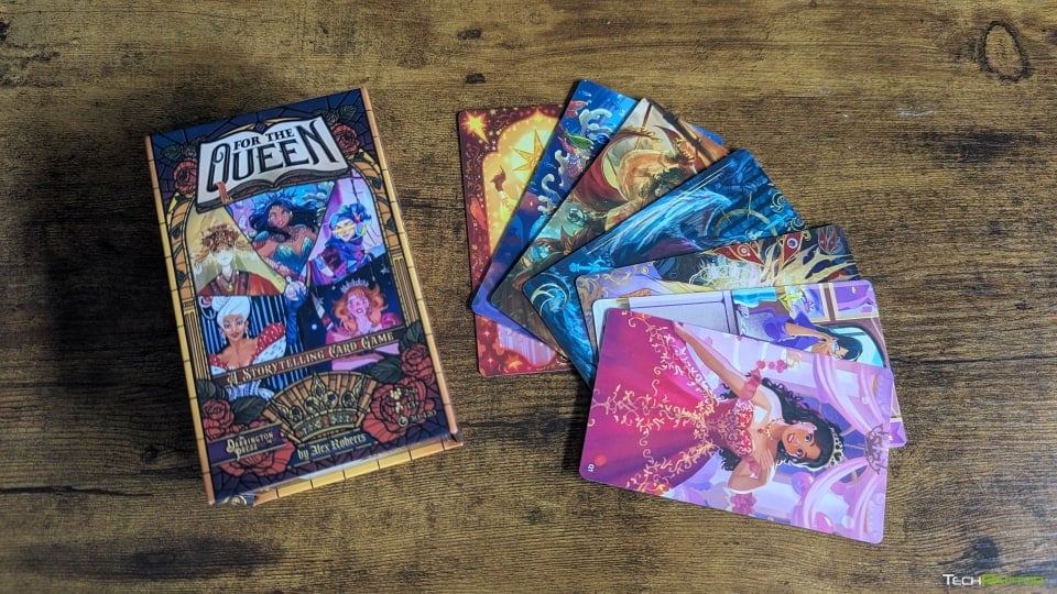 The box and Queen art cards from For The Queen