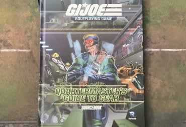 A copy of GI Joe Quartermaster's Guide to Gar on a gaming mat