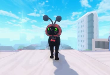 The feline protagonist from Little Kitty, Big City wearing a cute ladybug hat