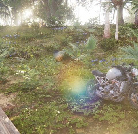 Once Human Vehicle Guide - Cover Image A Motorcycle Standing on Some Grass Next to Wood Foundations